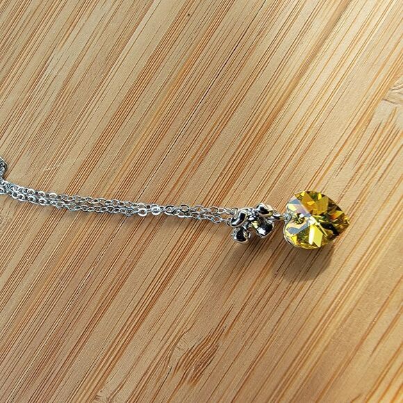 Swarovski Women's Silver and Yellow heart necklace - Picture 2 of 6